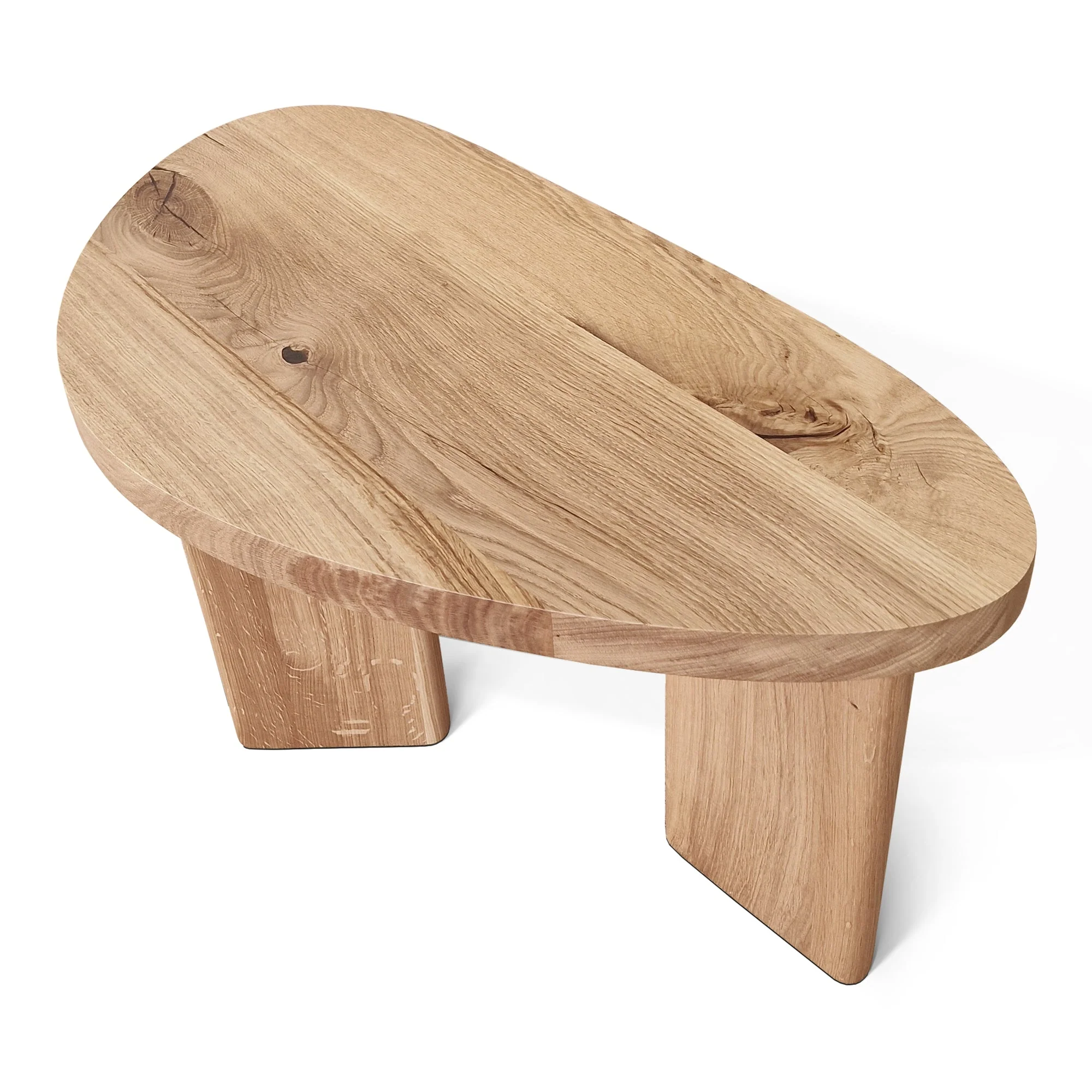 Oak Coffee Table - The Coffee Table showcases a beautifully organic shape crafted from solid oak - highlighting its naturally smooth surface and