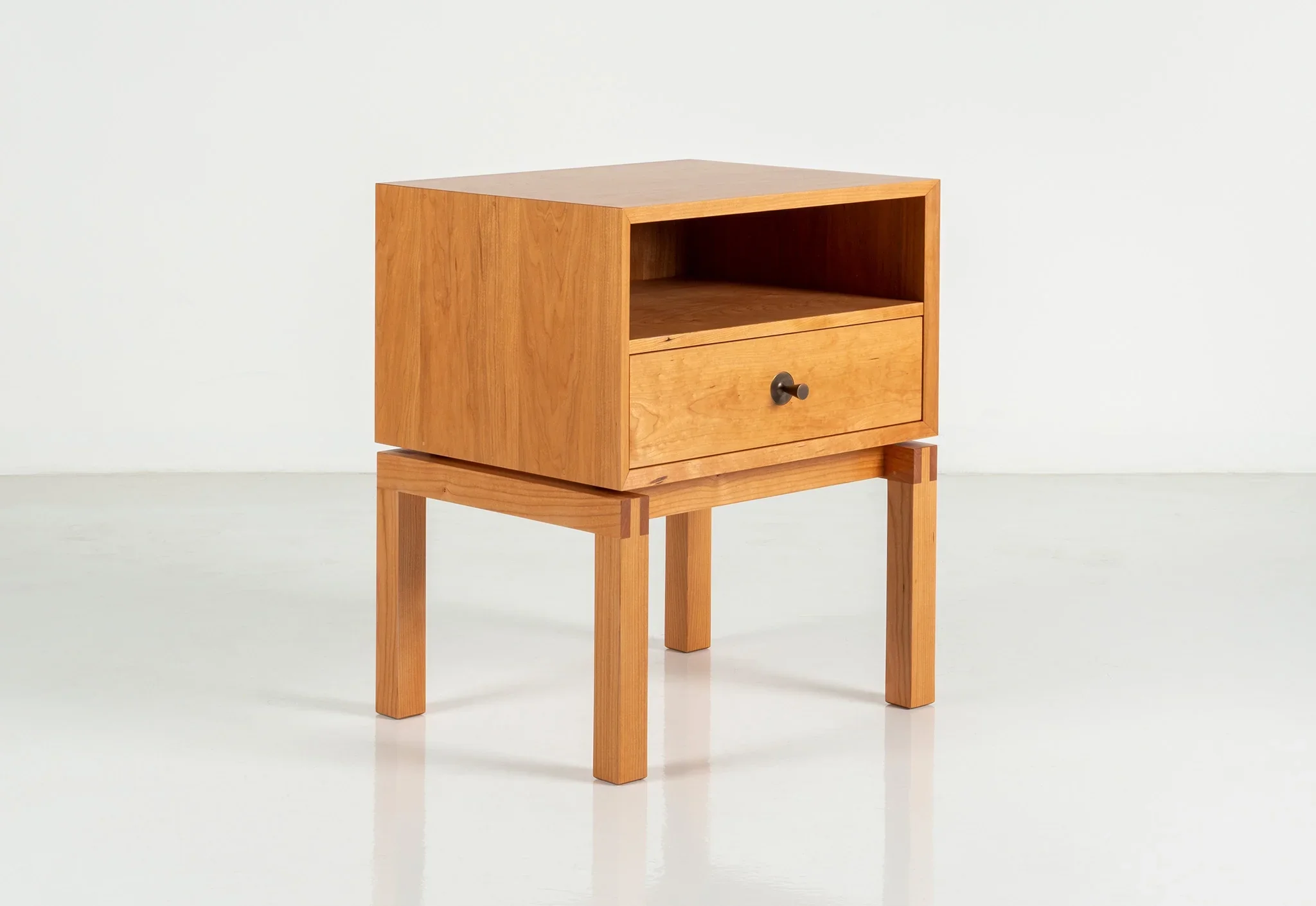 Side Table - Designed with cues from its namesake bed, the is a modest example of fine craftsmanship