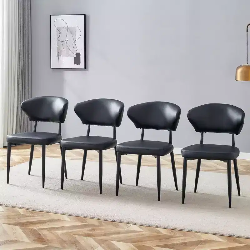 Set of 4 Black Minimalist Ergonomic Dining Chairs with Curved Backrest &ndash; PU Cushion