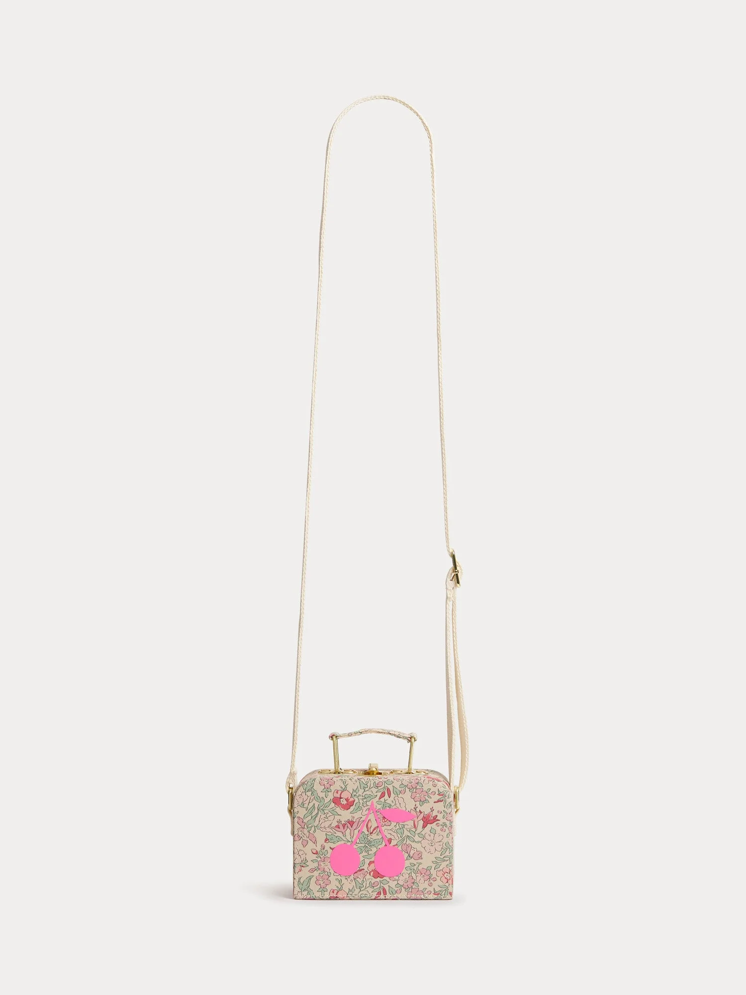 raspberry-colored suitcase bag in fabric with a cherry print in organic cotton